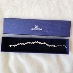 Swarovski bracelet with blue and white crystals, swan logo